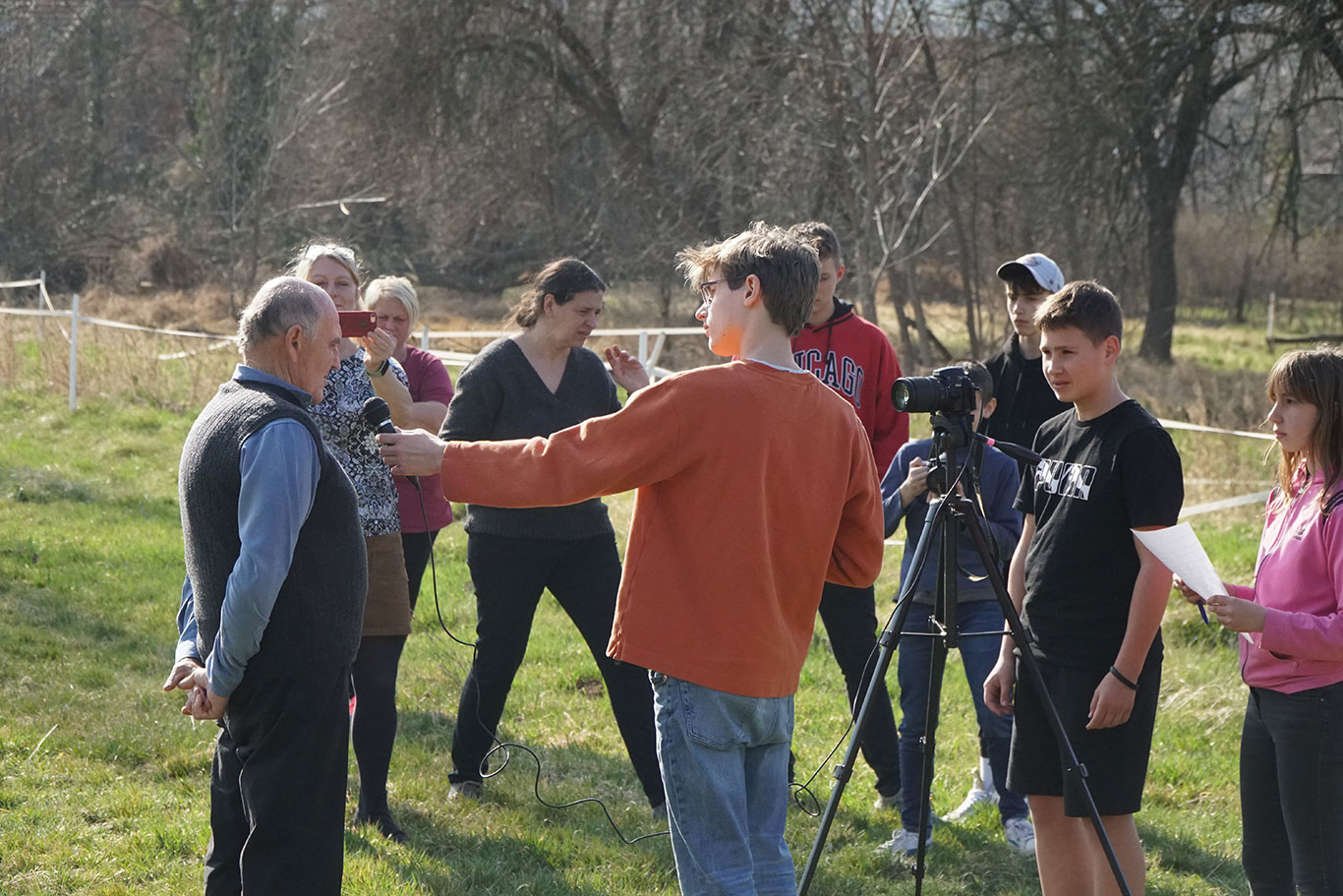 Kids interviewing a farmer