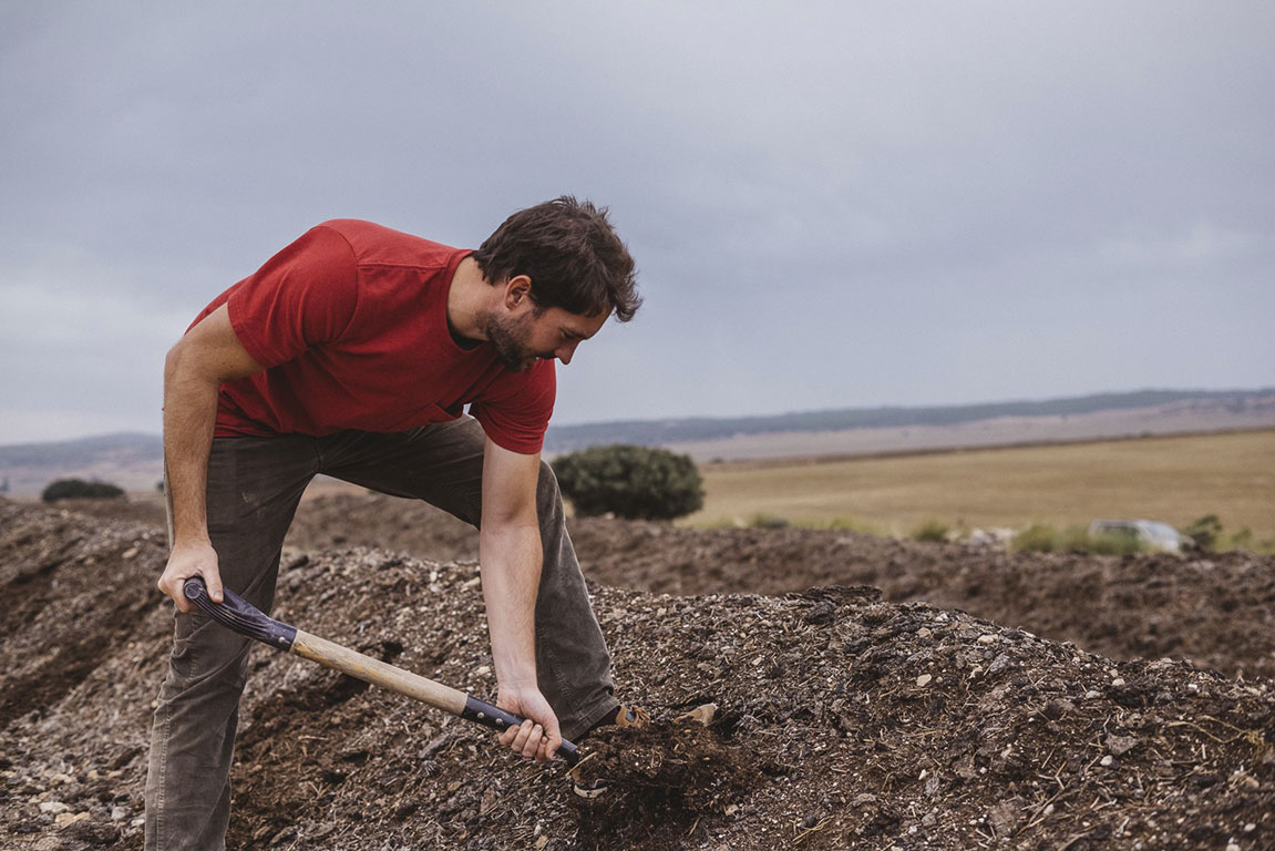 man working with land 