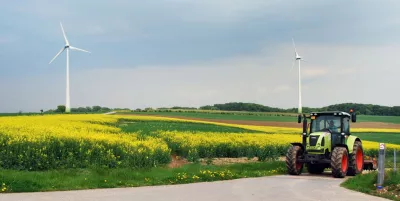 Tractor going through the countryside