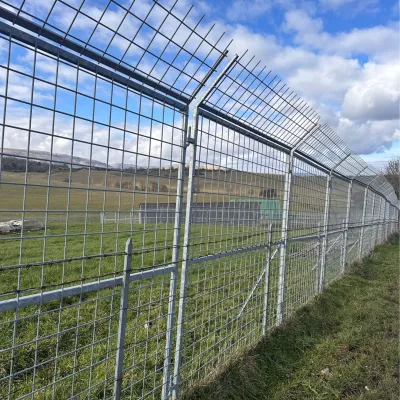 Innovative fencing stacked placed against a wooden fence