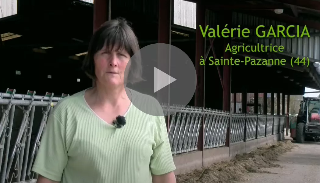 A woman standing outside a barn at 'Black White Framed Business Card'