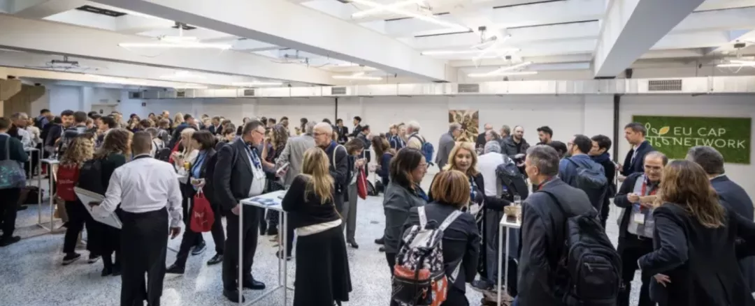 EU CAP Network stakeholders during the launch event chatting during a coffee break