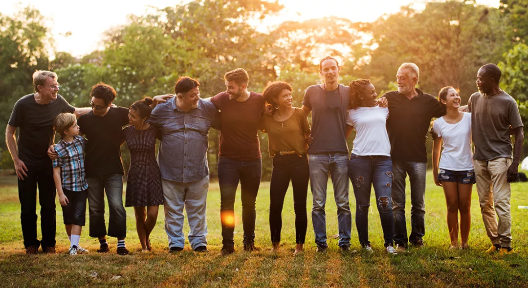 Group of people support unity arm around together