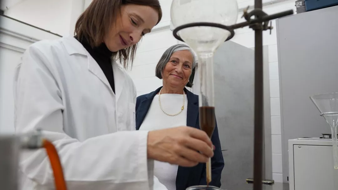 two women in a distillery lab 