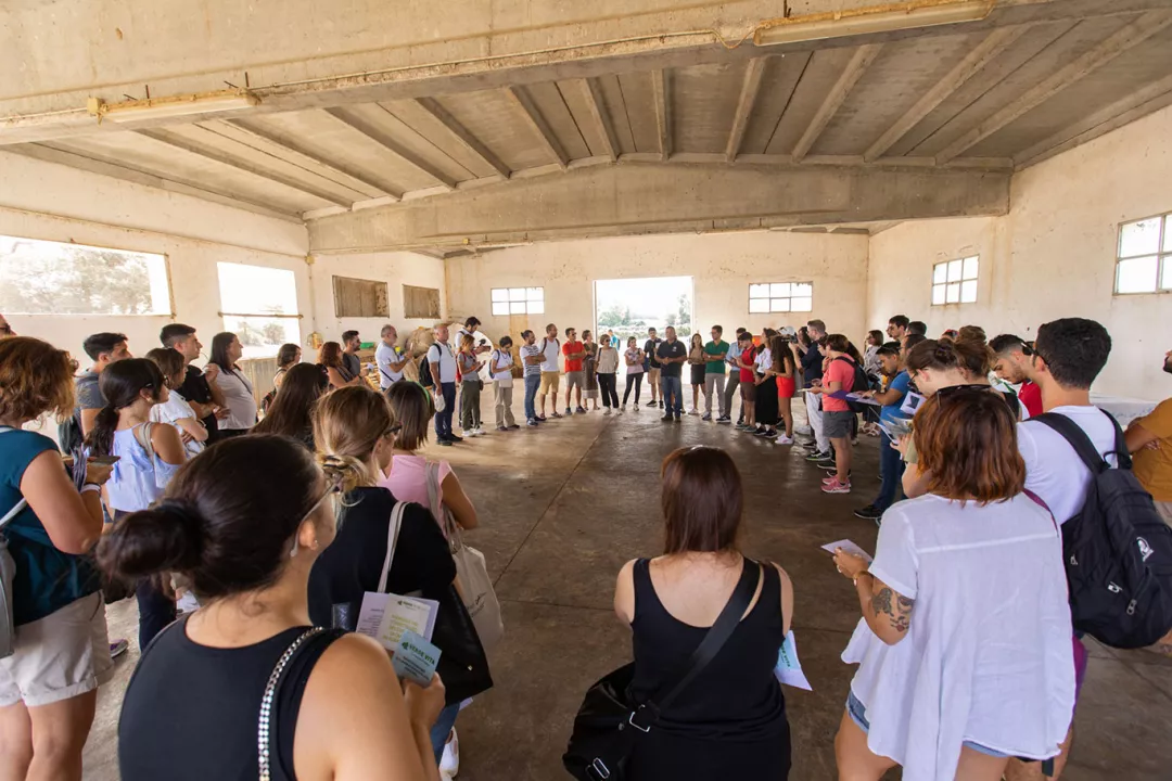 young people standing in a circle