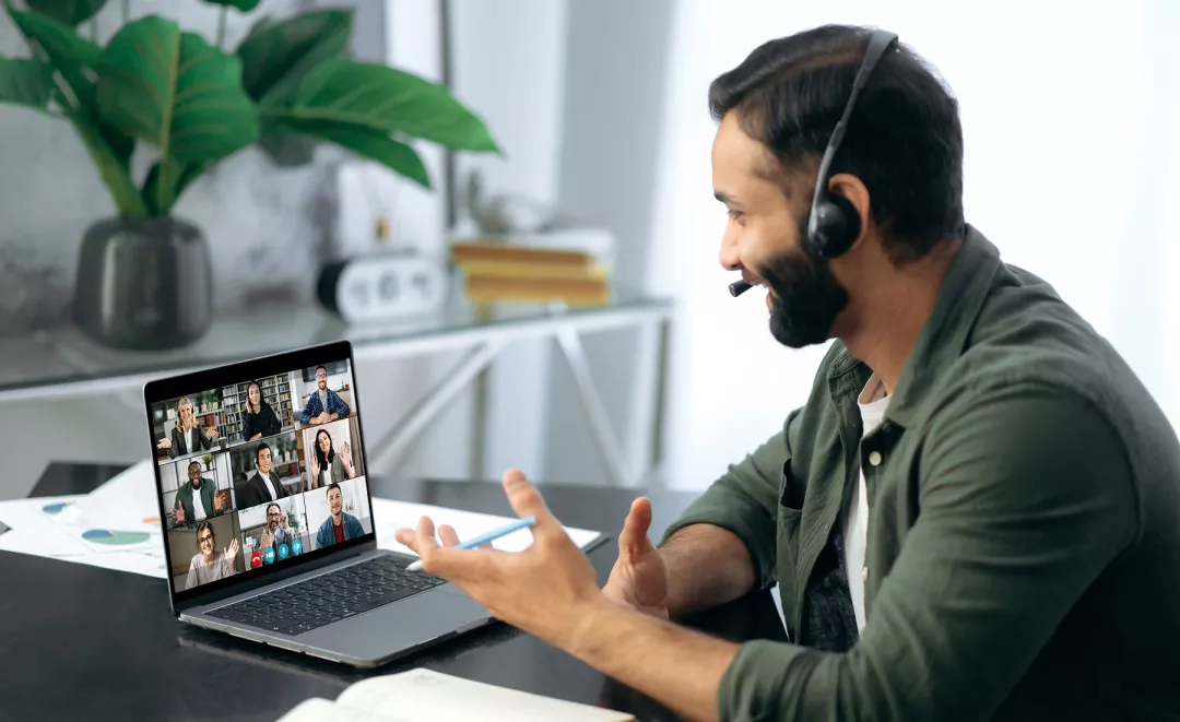 man in video conference on his laptop