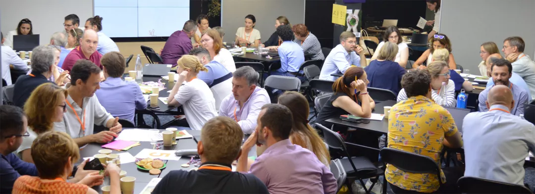 People in a room during a capacity building event