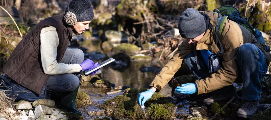 Young Adult Biologists collecting water samples
