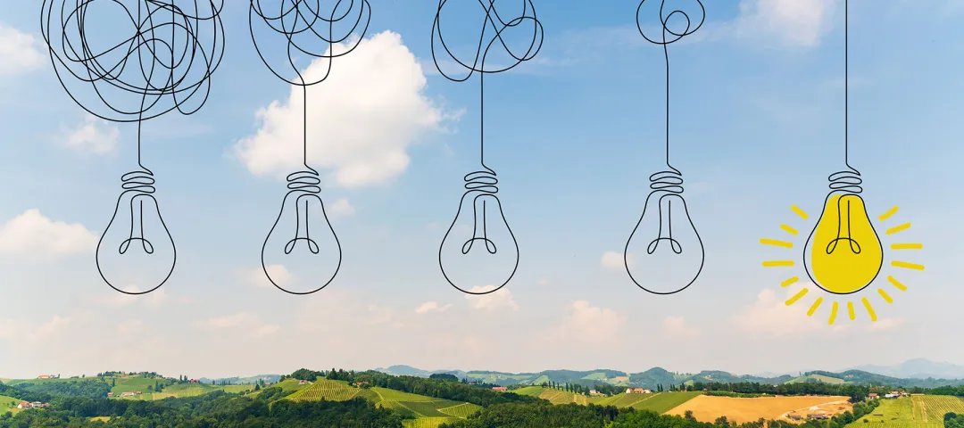 light bulbs illustration on a farm landscape