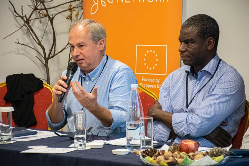 a man sitting at the table speaking into a microhone at the workshop on "How to assess direct payment interventions in the new CAP"