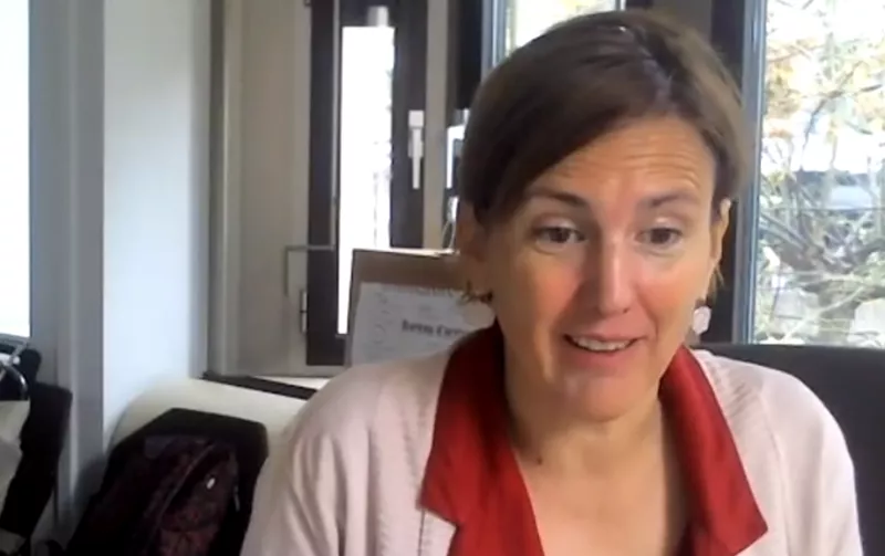 a woman with brown hair and a red collared shirt at the Thematic Group on Strengthening the position of farmers in the organic food supply chain