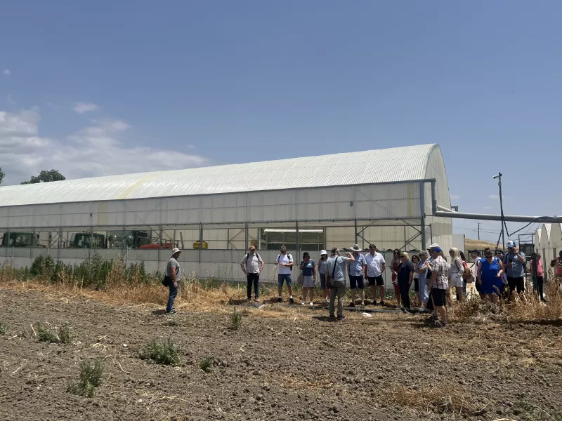 group in front of farm