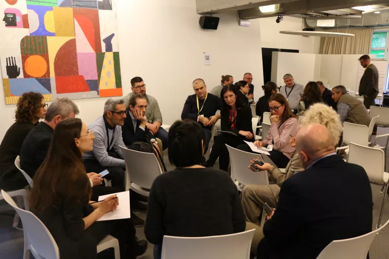 Participants discuss in an interactive session at the FSDN Workshop