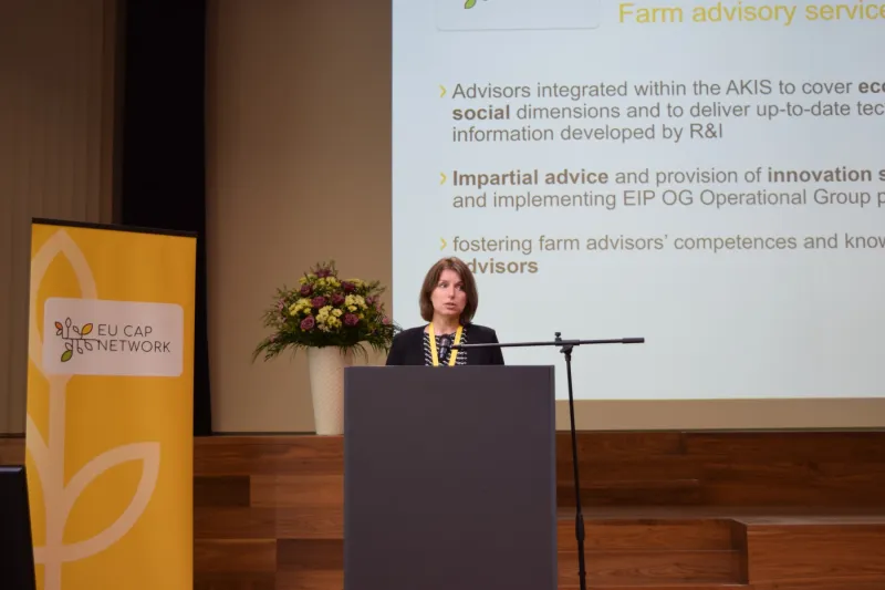 Woman presenting at the event