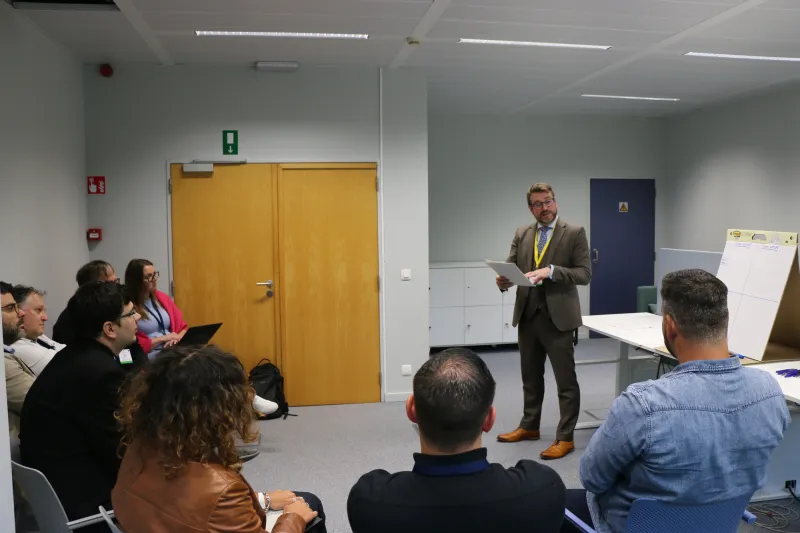 Group of people listening to presentation