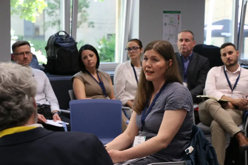 Member speaks during plenary session