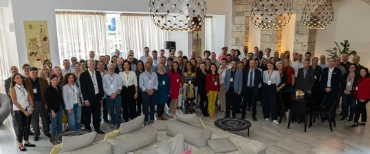 a group of people standing in a room for a picture at the workshop on "How to assess direct payment interventions in the new CAP"