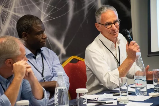 a group of men sitting at a table at the workshop on "How to assess direct payment interventions in the new CAP"