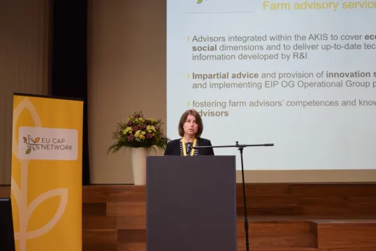 Woman presenting at the event