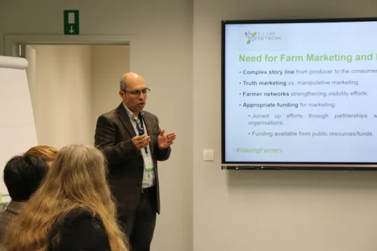 Man presenting at the event