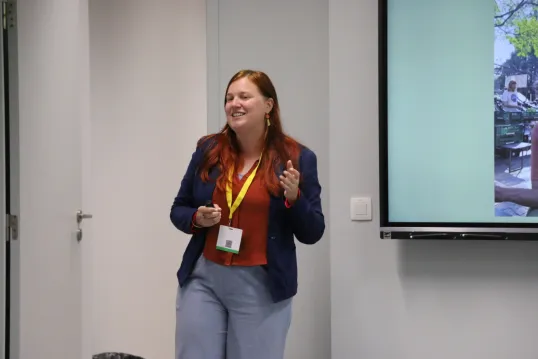 Woman presenting on event