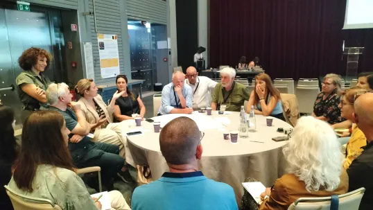 Working group discussing around table